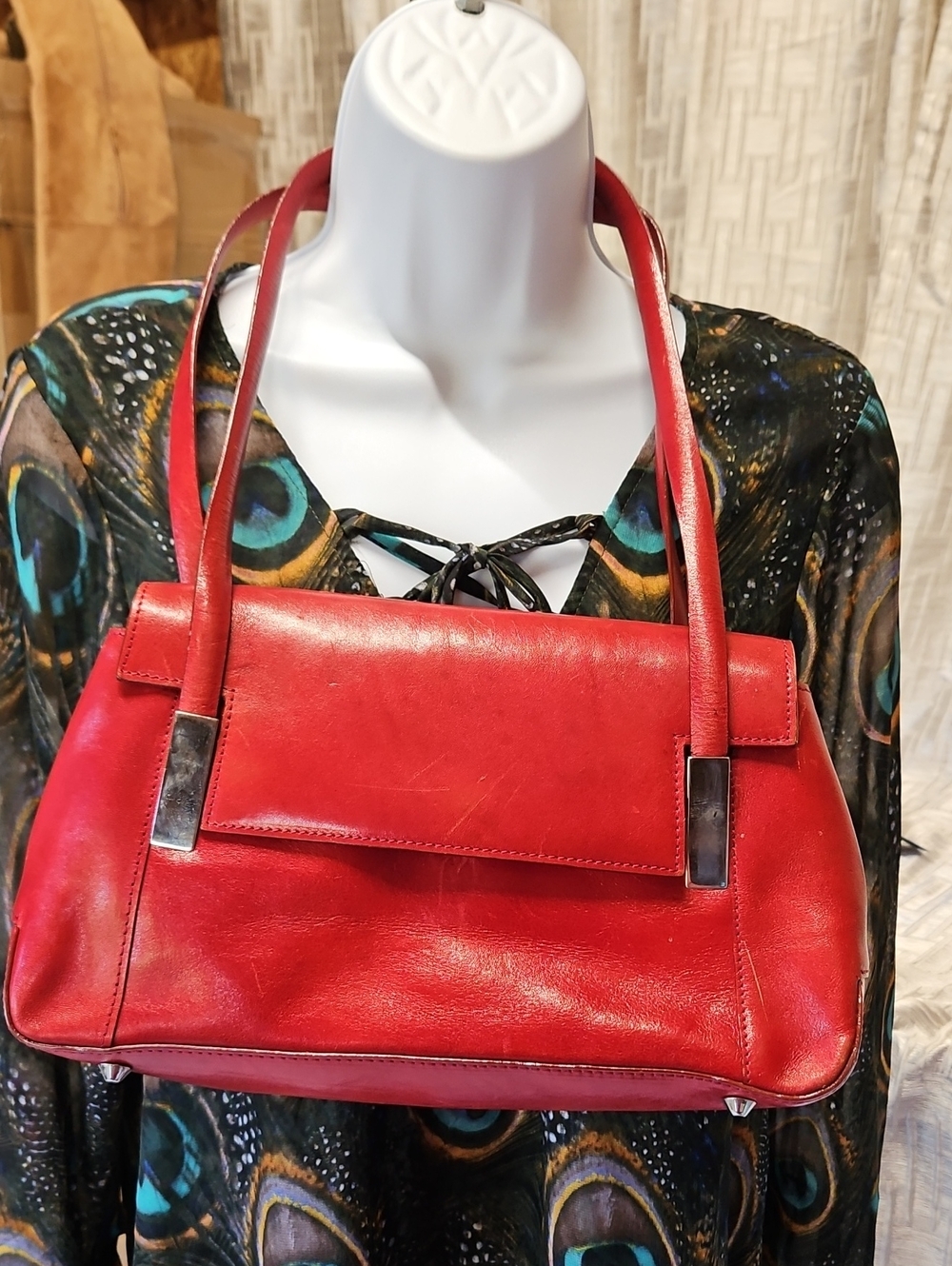 Elegant Red Leather Shoulder Bag with Metal Accents